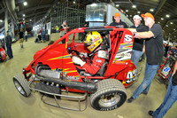 Jake Rosario, of Guthrie, Oklahoma gets a push down to the track for last minute practice on Saturday.